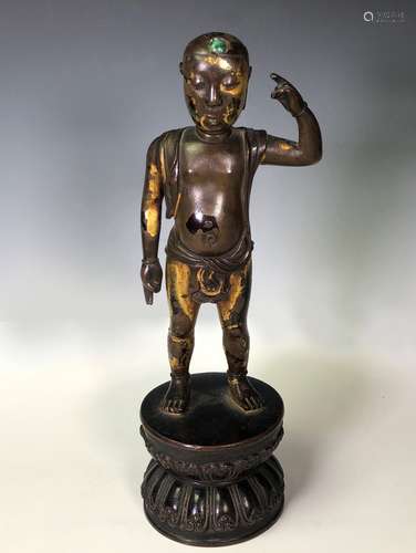 Gilt bronze figure with turquoise stone