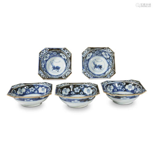 A set of five blue and white porcelain shaped dishes