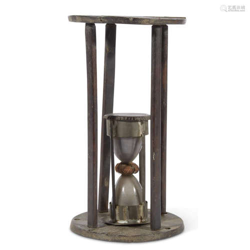 A WOOD AND GLASS HOURGLASS