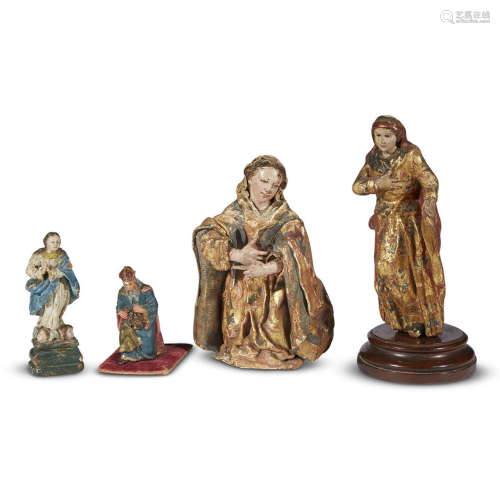 THREE CONTINENTAL POLYCHROMED GESSO AND GILTWOOD FIGURES OF THE VIRGIN