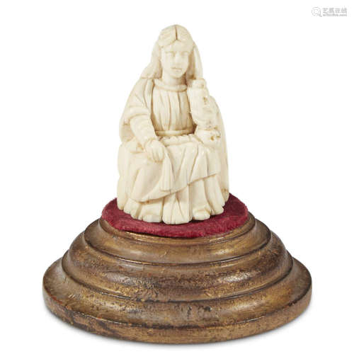 AN ITALIAN CARVED IVORY FIGURE OF THE MADONNA AND THREE OTHER CARVINGS