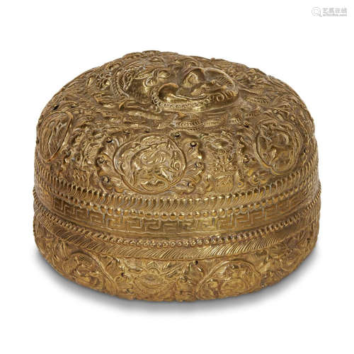 A HAMMERED BRASS BOX AND COVER, PROBABLY NEPALESE