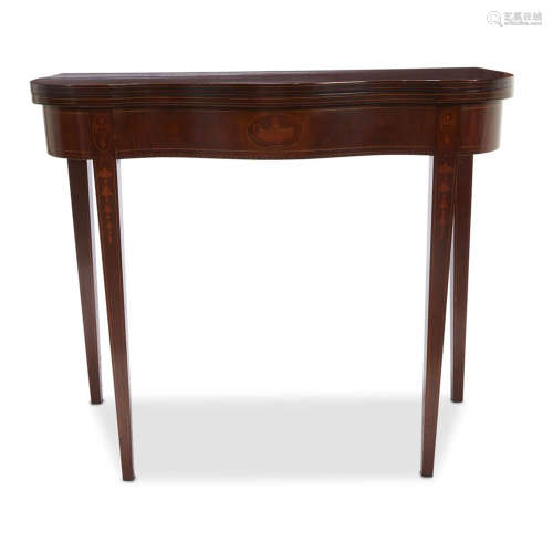 A Federal style inlaid mahogany games table