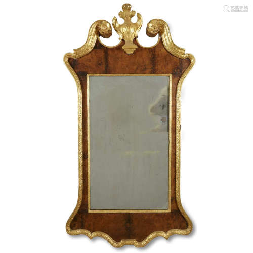 A George II style burl walnut and parcel-gilt looking glass