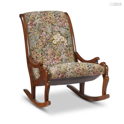 A Victorian mahogany rocking gout chair