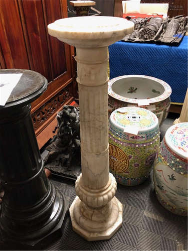 A white marble pedestal