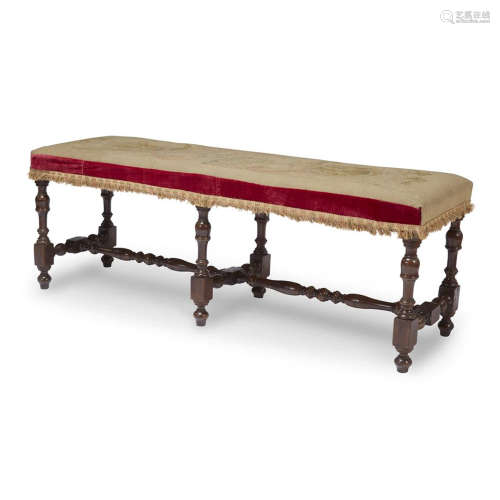 A LOUIS XIII STYLE TURNED WALNUT BENCH