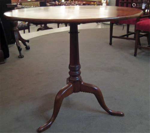 A Chippendale cherrywood tilt top tea table