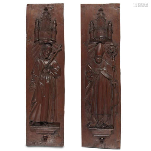 A PAIR OF GOTHIC REVIVAL CARVED WOOD ECCLESIASTICAL PANELS