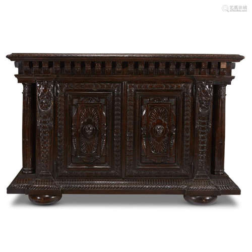 A LARGE ITALIAN RENAISSANCE STYLE CARVED WALNUT CUPBOARD