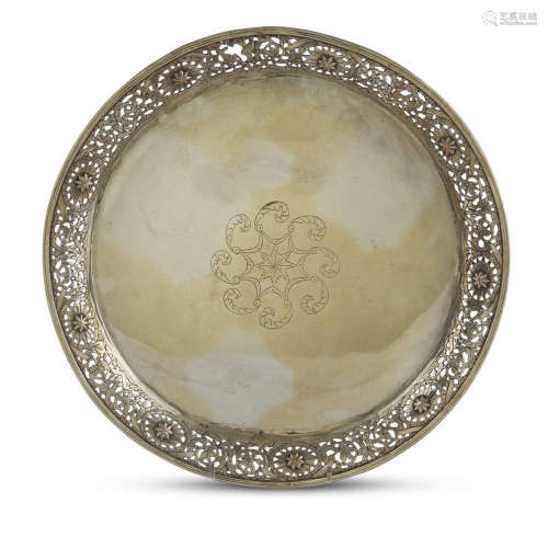 A CIRCULAR SILVER TRAY WITH RETICULATED TRIM