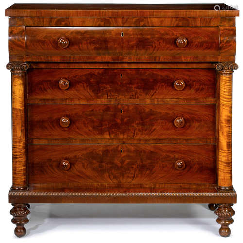 A Classical mahogany and maple chest of drawers