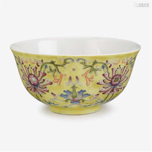 A Chinese famille rose yellow ground bowl