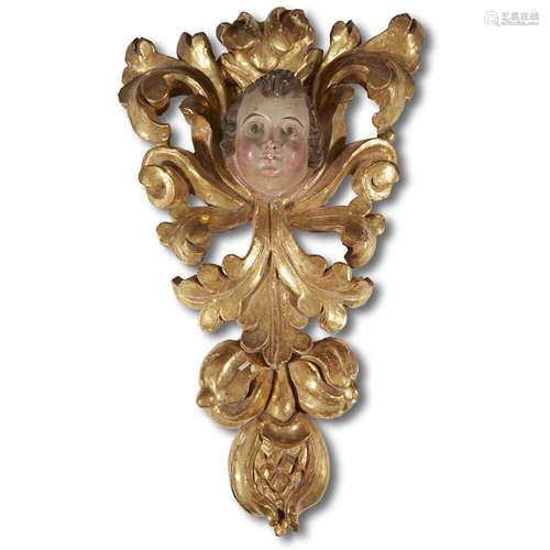 A MEXICAN POLYCHROMED AND GILTWOOD FIGURAL SPANDREL