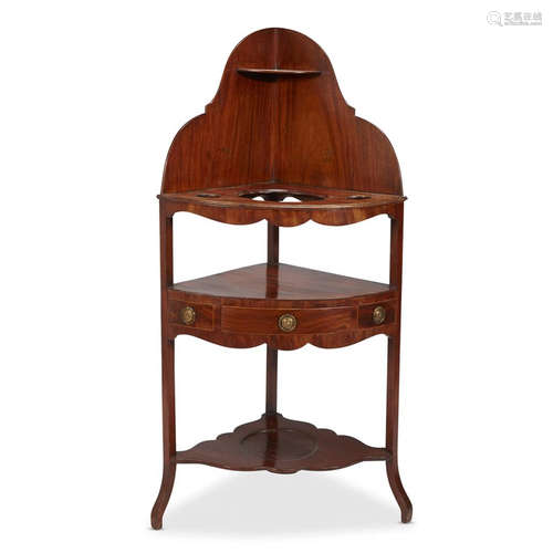 A George III mahogany corner washstand