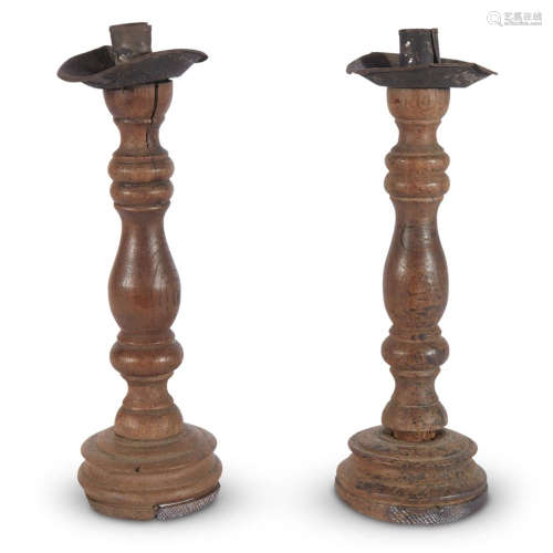 A PAIR OF EARLY TURNED WOOD AND TOLE CONTINENTAL CANDLESTICKS