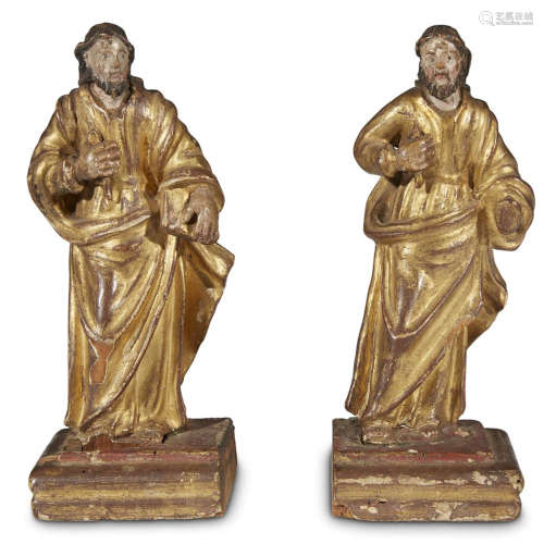 A PAIR OF POLYCHROMED GESSO AND GILTWOOD SANTOS FIGURES