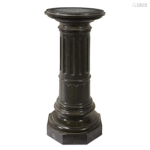 A green marble pedestal