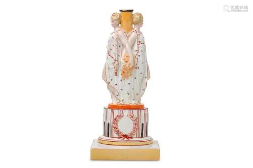 A CONTINENTAL PORCELAIN FIGURAL CENTREPIECE OR STAND