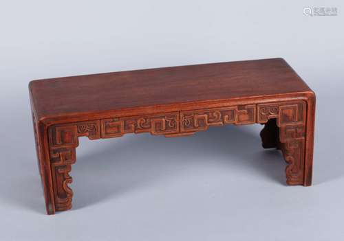 A Chinese Carved Huanghuali Tea Table