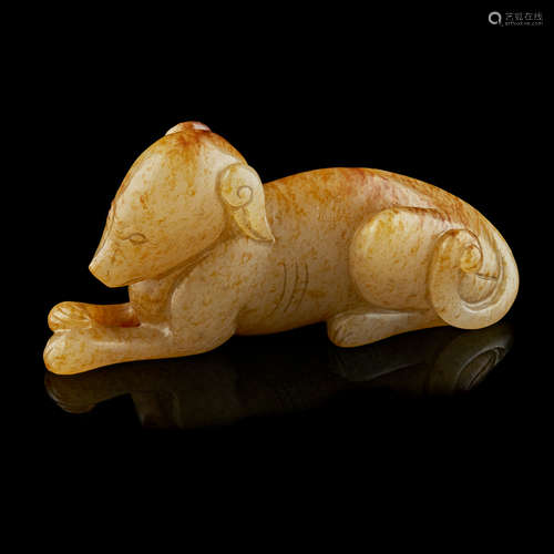 CARVED YELLOW JADE MODEL OF A HOUND