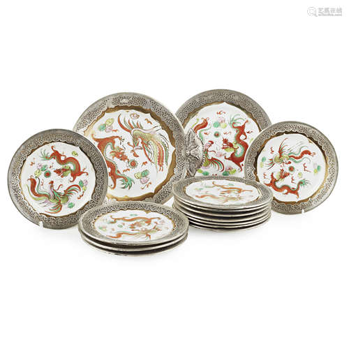 COLLECTION OF THIRTEEN SILVER-MOUNTED FAMILLE ROSE PLATES