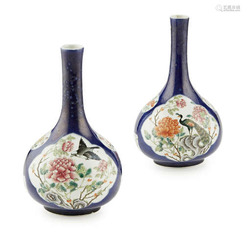 PAIR OF FAMILLE VERTE BLUE GROUND BOTTLE VASES