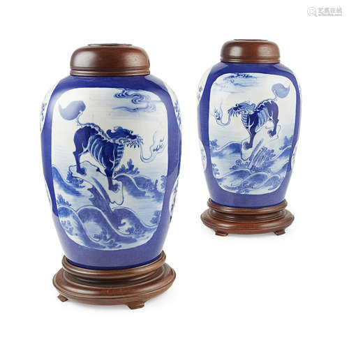 PAIR OF OVOID BLUE-GROUND JARS AND WOODEN COVERS