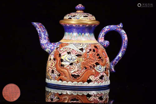 A ZISHA TEAPOT OF DRAGON AND PHOENIX WITH POETIC MARKING