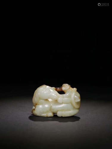 A HETIAN JADE ORNAMENT DEPICTING A MAN ON A HORSE