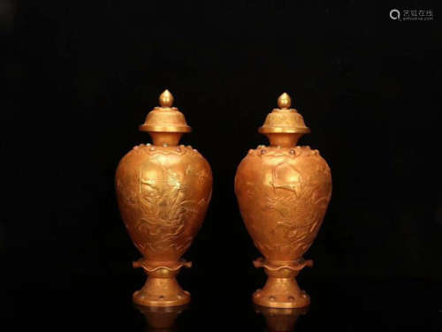 A PAIR OF GILT BRONZE VASES WITH MOUNTED ARCHERY PATTERNS