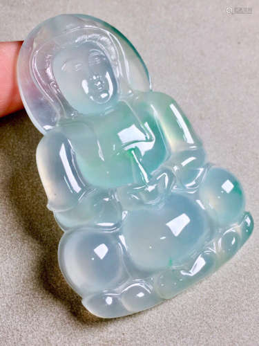 A TRANSPARENT JADEITE WITH SHAPE OF GUANYIN