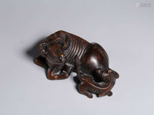 A CHENXIANG WOOD ORNAMENT OF BEAST SHAPED