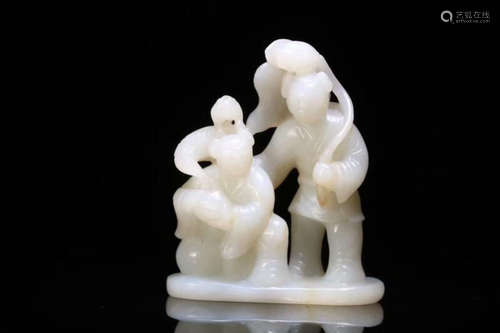 A HETIAN JADE ORNAMENT OF TWO CHILDREN