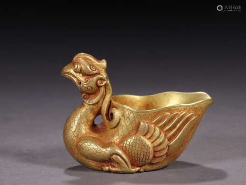 A GILT BRONZE PHOENIX SHAPED CUP