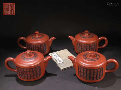 A SET OF GU JING ZHOU BRAND ZISHA TEAPOTS WITH MARKING