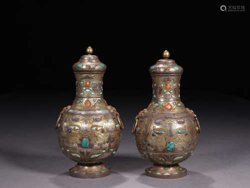 A PAIR OF SILVER VASES EMBEDED TURQUOISE STONE