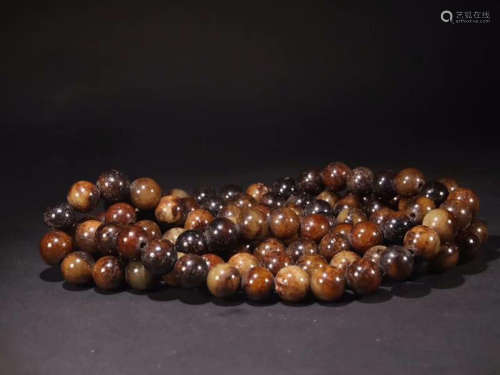 A NECKLACE MADE OF 108 OLD JADE BEADS