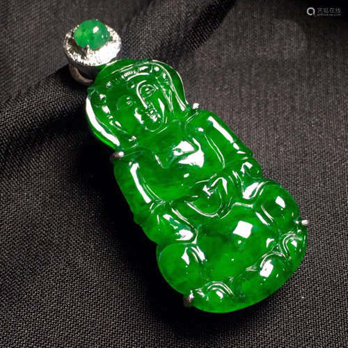 A GREEN PENDANT OF GUANYIN