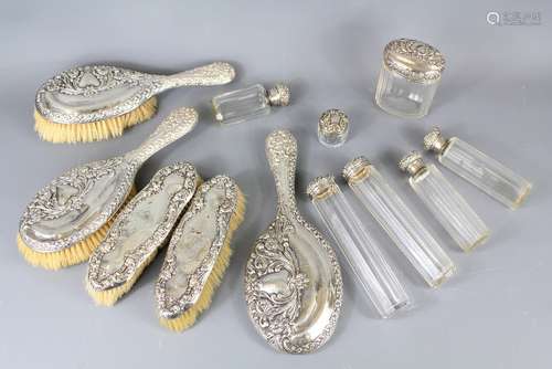 An Edwardian Twelve Piece Silver Dressing Table Set