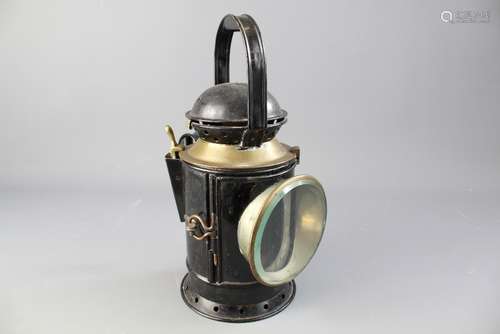 A GWR Guard's Lamp, approx 33 cms, black enamel and brass, embossed with company initials