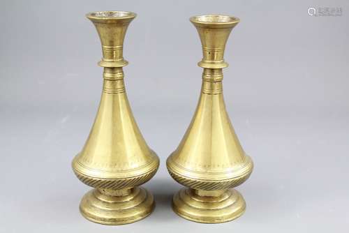 A Pair of 19th Century Mughal Brass Conical Vases, bulbous vases supported on a spreading foot, approx 22 cms