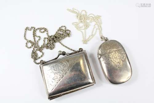 A Silver Vest and Chain, Birmingham hallmark, mm Hilliard & Thomason, dated 1894, approx 35 gms together with another silver-metal purse on chain