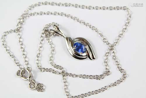 A 9ct White Gold Sapphire Pendant and Chain