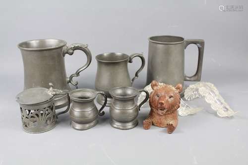 A Quantity of Pewter including three tankards, two miniature tankards, mustard and cover, two glass spoon rests and a brass trivet