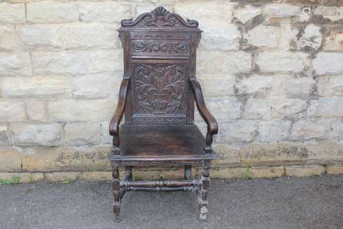 An Antique Oak Hall Chair