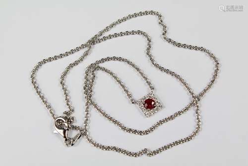 An 18ct White Gold Diamond and Ruby Pendant and Necklace