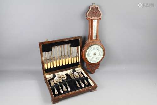 An Edwardian Oak Cased Banjo Barometer