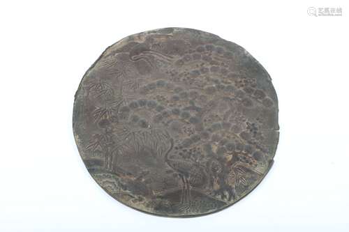 A Chinese Bronze Mirror