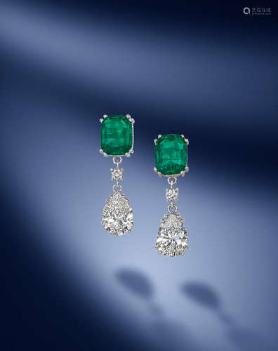 A pair of emerald and diamond pendent earrings